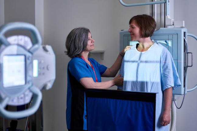 A patient prepares for an x-ray exam at Whitehorse General Hospital.